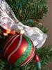 christmas ornament on tree with ribbon